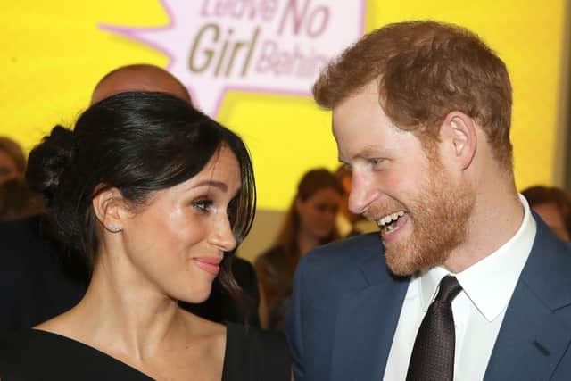 Prince Harry (right) and his wife Meghan (left) have moved to California. Picture: Chris Jackson/PA Wire