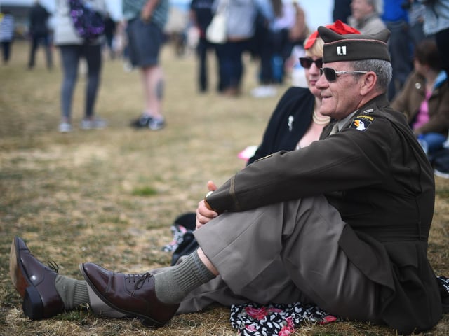A man in US Airborne period dress during the commemorations