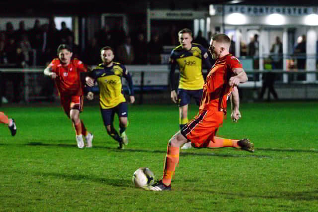 Lee Wort about to put Portchester ahead. Picture by Daniel Haswell