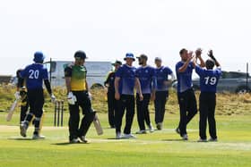 Portsmouth celebrate the wicket of Sarisbury's Matt Journeaux during their Southern Premier League win at St Helens. Picture by Sam Stephenson