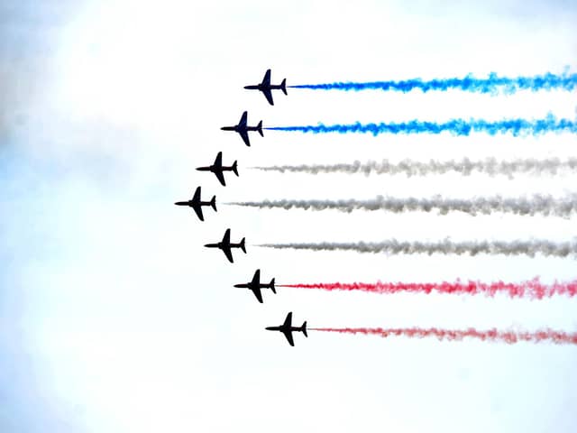 Red Arrows performing a flypast at the Goodwood Festival of Speed 2022. Pic S Robards SR2206232.