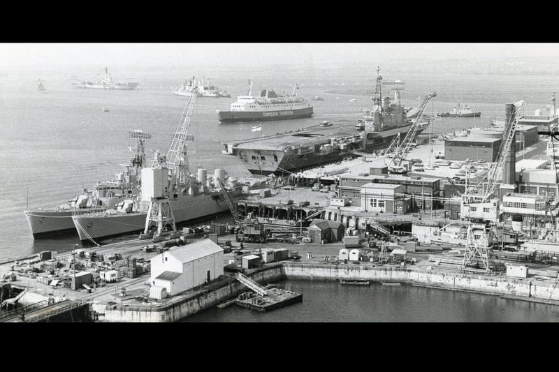 View of the Dockyard and HMS Hermes in 1983. The News PP1840