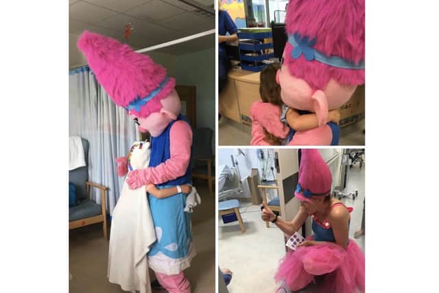 Poppy from Trollz visiting the children's ward at Queen Alexandra Hospital before lockdown came in, courtesy of Helen Wallis