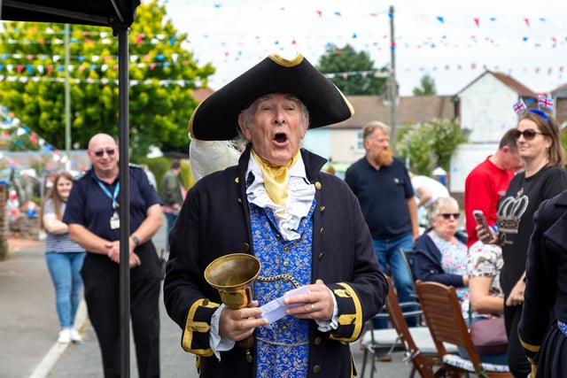 Town crier Barry Roberts, 77, announces the Mayor at the opening of the Selsey Avenue jubilee street party in Gosport