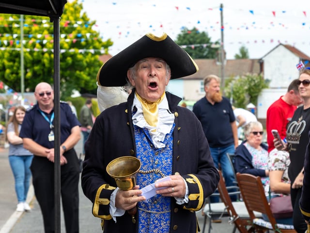 Town crier Barry Roberts, 77, announces the Mayor at the opening of the Selsey Avenue jubilee street party in Gosport