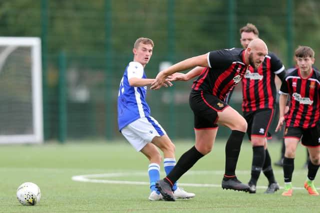 Fleetlands defender Jim Duffin, right, has decided to retire. Picture: Chris Moorhouse