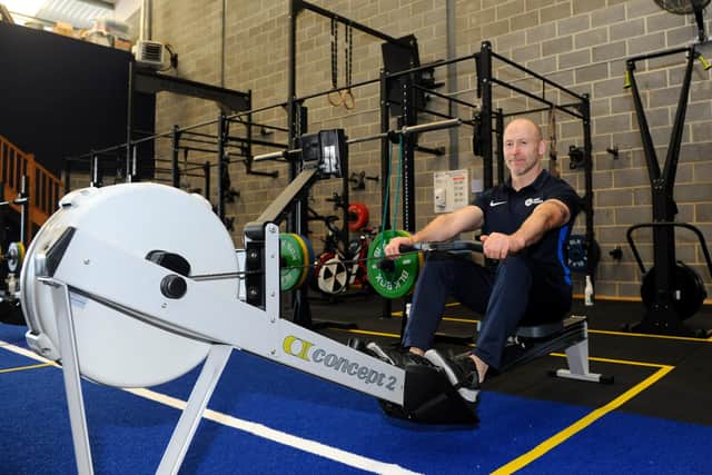 Hopeful Sean Cole, head of SC Vital Fitness in Portsmouth,  tests out one of the rowing machines which he hopes clients will soon be using. 
Picture: Sarah Standing (230620-324)