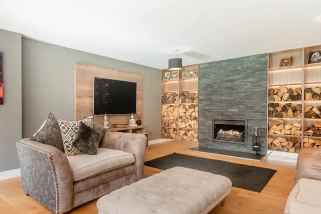 The listing says: "This exceptional, multi-generational family house benefits from some striking architectural design features following extensive remodelling in 2019. A generous open plan reception hall introduces one to an eye-catching sightline through the house towards the garden."