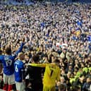 Pompey players celebrate with fans at Fratton Park