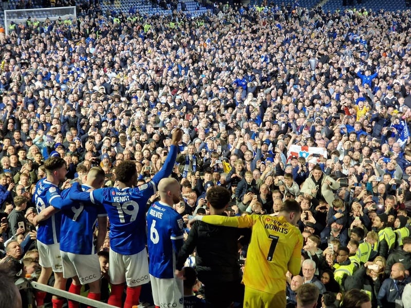 Pompey players celebrate with fans at Fratton Park
