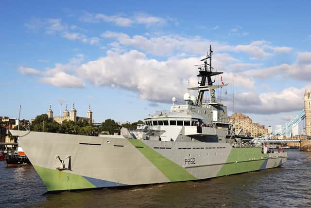 Pictured: HMS Severn passes under Tower Bridge prior to berthing alongside HMS Belfast on the River Thames in London, on Friday 27th August 2021