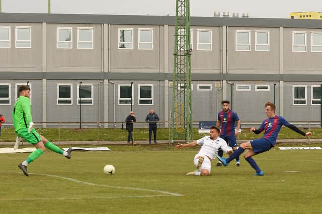 James Franklyn fires US Portsmouth into the lead against Binfield. Picture: Keith Woodland
