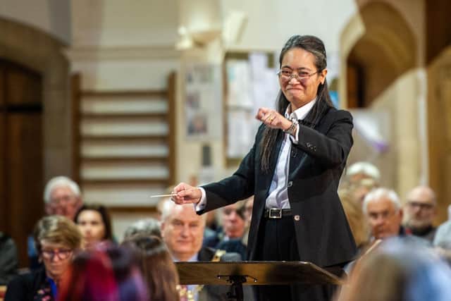 Portsmouth Philharmonic conductor Ka Wai Cheng at its December concert at the Church of the Resurrection.