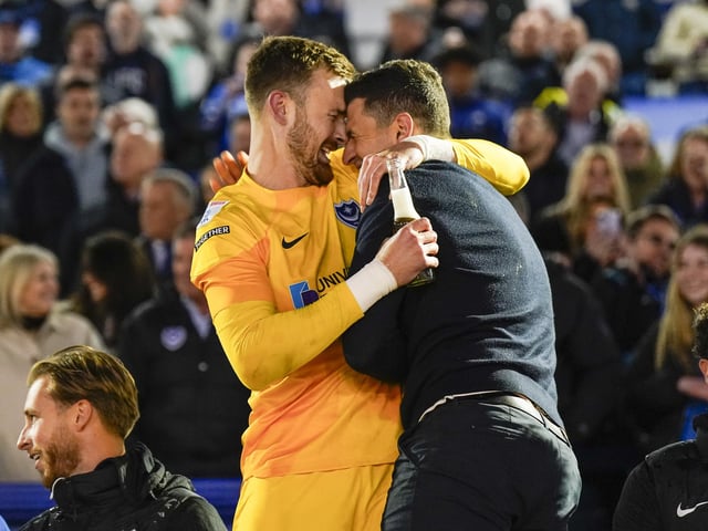 Will Norris and John Mousinho embrace after Pompey win the League One title against Barnsley in April 2024. Picture: Jason Brown/ProSportsImages