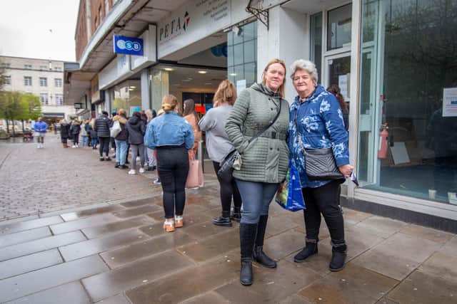The Big reopeningPictured: Julie and Susan Piggott queuing on Arundel street to shop at Primark, Commercial Road, Portsmouth on 12 April 2021Picture: Habibur Rahman