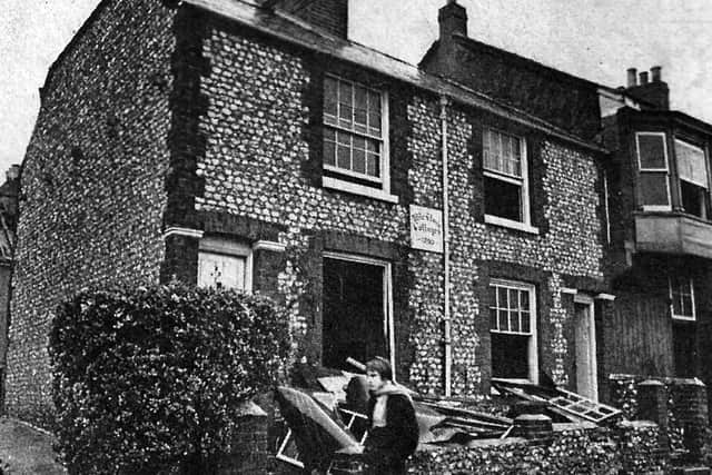 18th century Mile Stone Cottages being demolished in 1970.  Picture: The News archive.