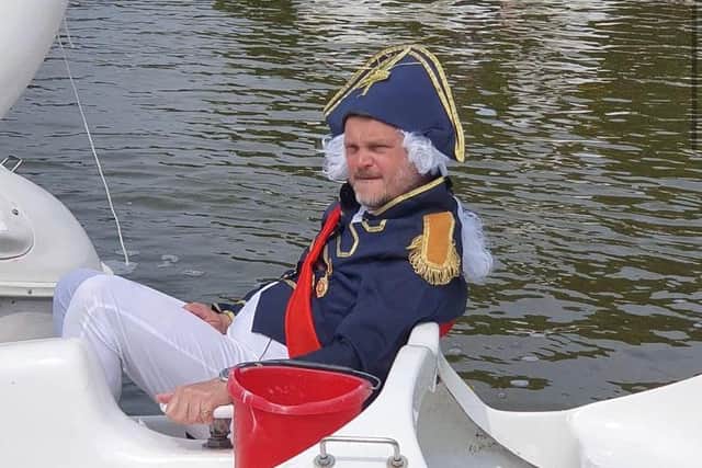 Comedian Al Murray pictured in a Napoleonic-style uniform on a swan pedalo. Photo: Instagram/Graham Culton