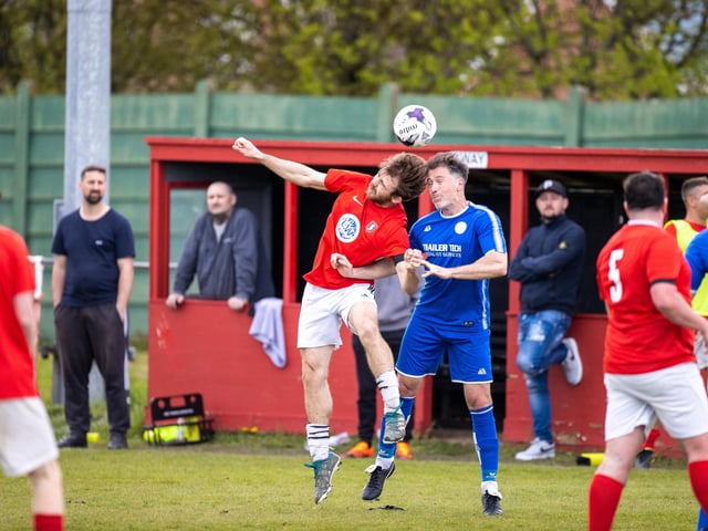 Action from Gosport Town's 4-0 victory over Lee Rangers (blue kit) in the Portsmouth & District FA Trophy final at Cams Alders. Picture: Alex Shute