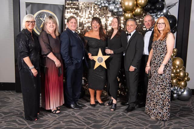 Emerge Team celebrates Managing Director's win.