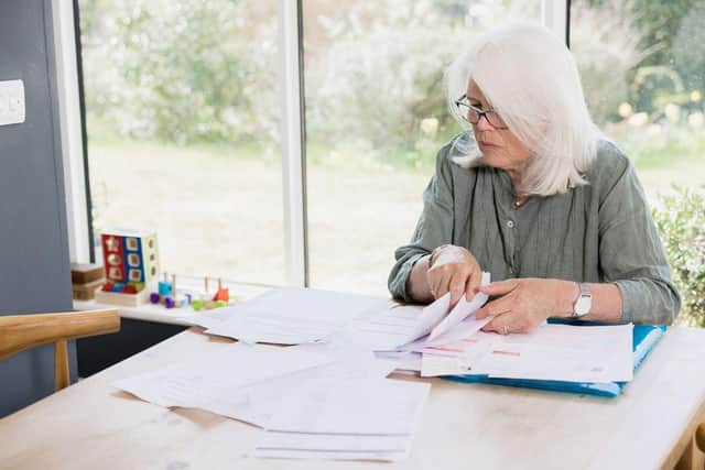 A lady organising paperwork