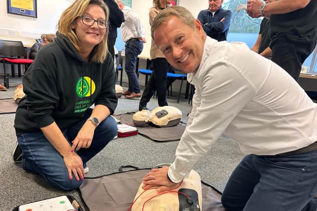 MD Darren Cooper receives CPR training