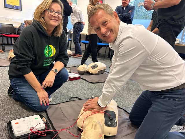 MD Darren Cooper receives CPR training
