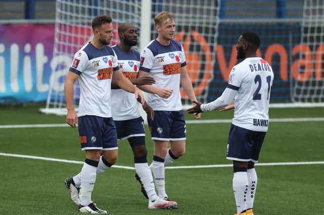 Hawks celebrate the Bedsente Gomis goal that took the to the FA Cup second round. Picture: Dave Haines