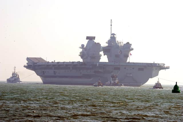 HMS Queen Elizabeth leaving Portsmouth on Monday, March 1.Picture: Sarah Standing (010321-1756)