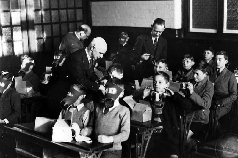 Gas mask fitting at Highland Road School, Southsea, 1939. The News PP289