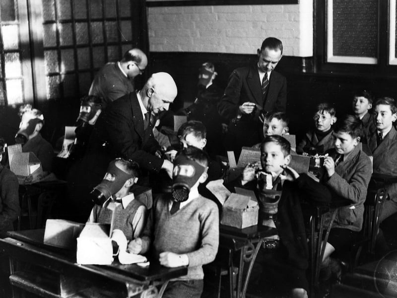 Gas mask fitting at Highland Road School, Southsea, 1939. The News PP289