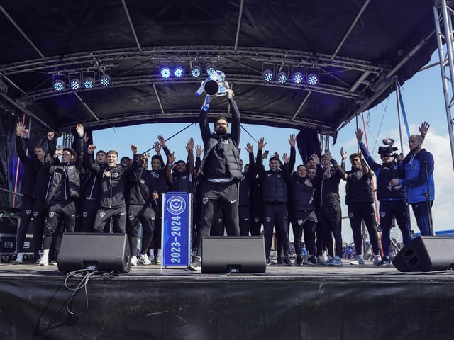 Marlon Pack lifts the League One trophy at Pompey's double title celebrations on Southsea Common in May 2024. Picture: Jason Brown