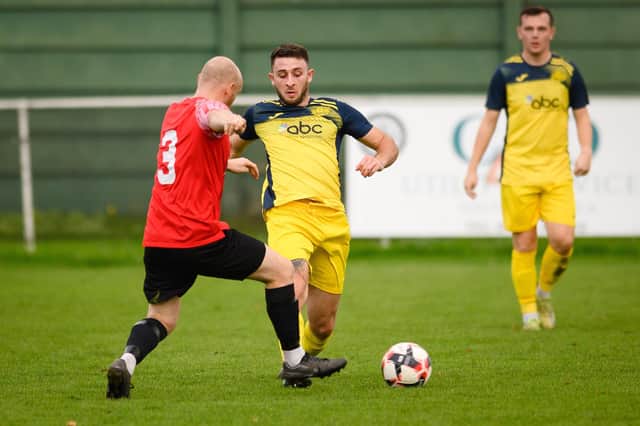 Moneyfields' Harry Sargeant, right, was switched from central midfield to right back against former club US Portsmouth in midweek. Picture: Keith Woodland