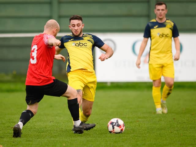 Moneyfields' Harry Sargeant, right, was switched from central midfield to right back against former club US Portsmouth in midweek. Picture: Keith Woodland