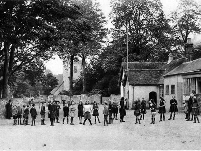 Droxford church and school
Sent in by J.H. Kemp of Lincoln of the village of Droxford between the wars, here we see some carefree pupils at the village school in the heart of the village alongside the church.