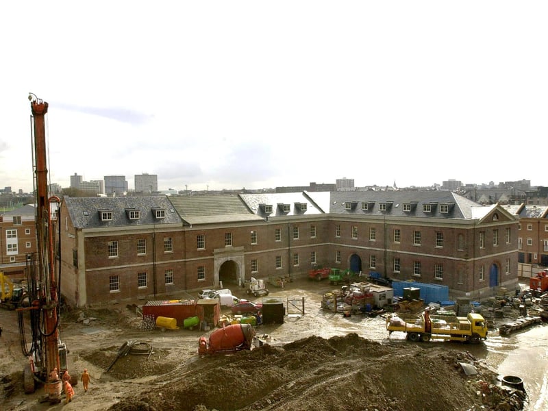 The Vulcan Building, with groundworks taking place on left to lay the foundation for the extension to the complex in Gunwharf Quays. The bell tower will be constructed above the archway. Picture: Michael Scaddan. 011686-0065