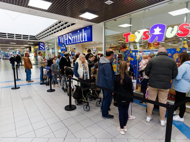 Families queued ahead of the opening of the store with the first 50 children receiving goodie bags.