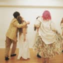 The Cast dancing