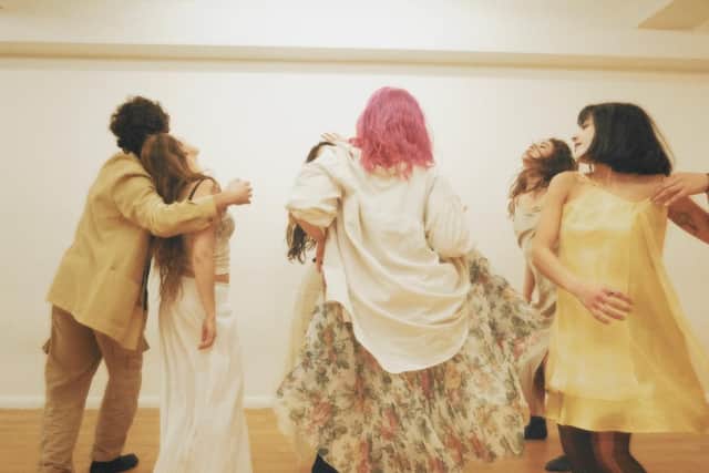 The Cast dancing