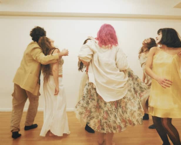The Cast dancing