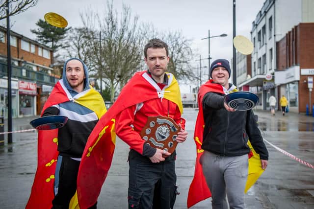 Pancake Day races taking place in The Precinct, Waterlooville, Portsmouth on 25 February 2020. Pictured: Competition winners, the Hamphire Flag team - Shane Govan, Mark Allibone and Lewis Andrews.  Picture: Habibur Rahman