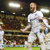 Connor Ogilvie celebrates his goal at Barnsley. Picture: Jason Brown.