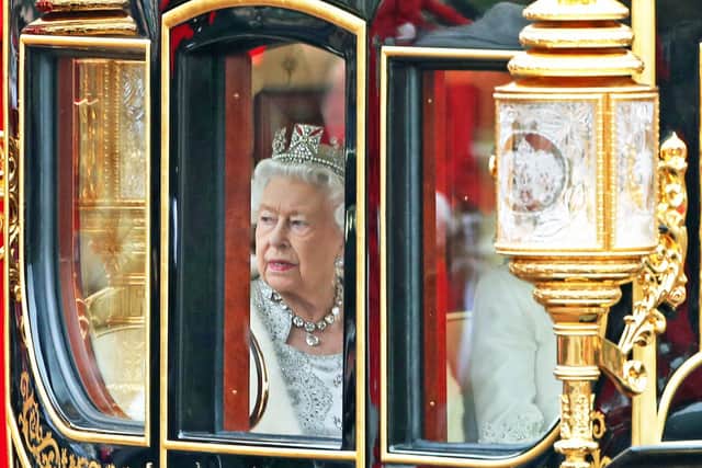 File photo dated 14/10/19 of Queen Elizabeth II returning to Buckingham Palace, London, in the Diamond Jubilee State Coach, having delivered the Queen's Speech. The Queen's Platinum Jubilee is being marked with a special four day bank holiday weekend from Thursday June 2 to Sunday June 5.