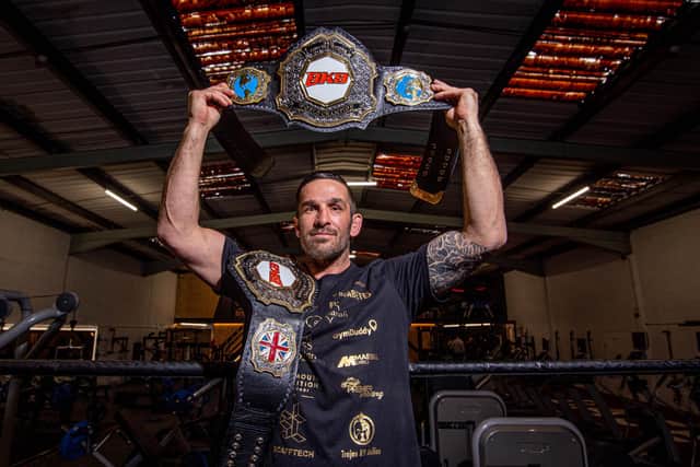 Mickey Parker proudly displays his BKB world and British cruiserweight titles Picture: Habibur Rahman