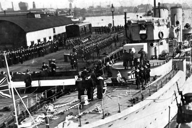 HMS Torbay at South Railway Jetty with the coffin of General Rawlinson in 1925. Picture: Robert James collection.