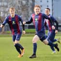 Frankie Paige (middle) has just scored a stunning goal to put US Portsmouth 2-0 up against Millbrook. Pic: Martyn White.