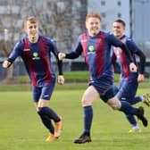 Frankie Paige (middle) has just scored a stunning goal to put US Portsmouth 2-0 up against Millbrook. Pic: Martyn White.