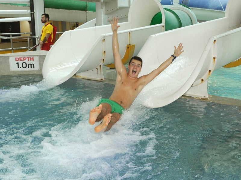 September 2014. The Southsea Pyramids re-opens after extensive refurbishment following the flooding earlier in the year. Student reporter Sam Poole (18) tries out the slide. Picture: Paul Jacobs (142822-56)