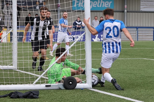 The Emsworth goalkeeper stops the ball crossing the line. Picture by Kevin Shipp