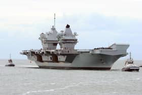 HMS Queen Elizabeth returning to Portsmouth.

Picture: Sarah Standing (040620-3867)