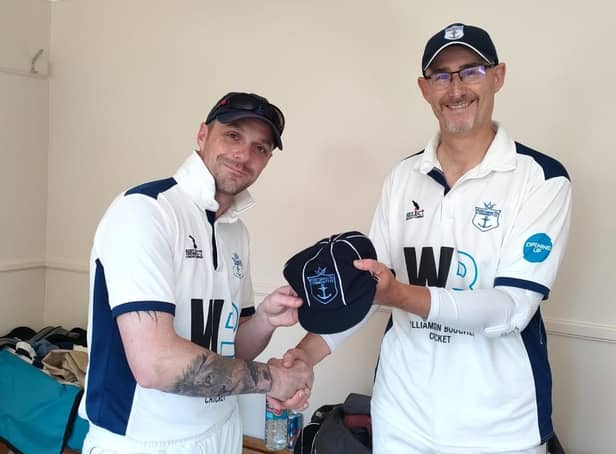 Vice captain Dave Going, left, is presented with a special cap on his 50th Portsmouth Community appearance by chairman Matt Barber.